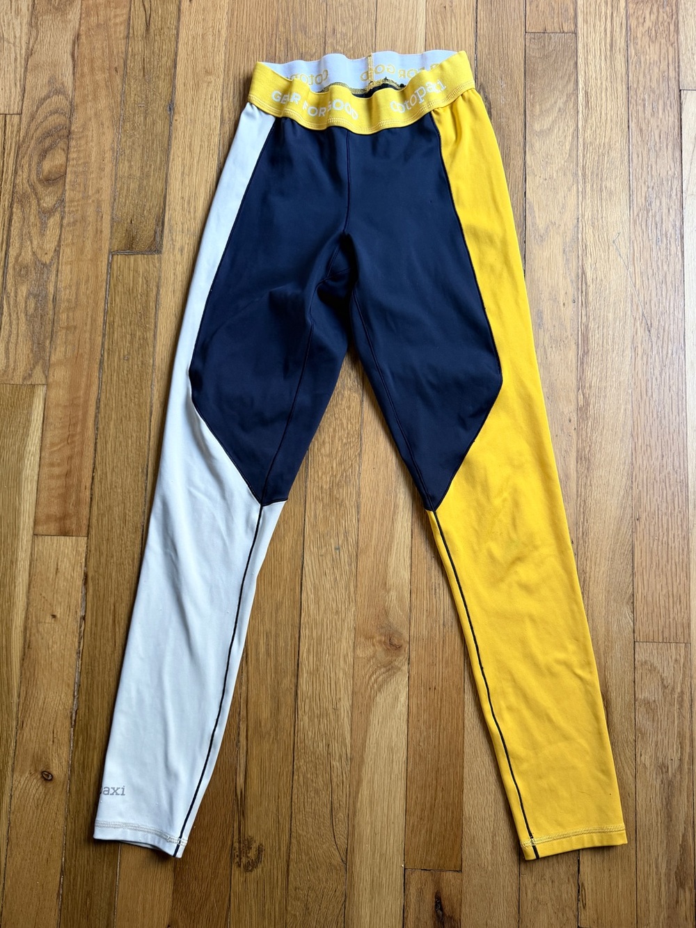 Cotopaxi yellow blue cream haraka leggings